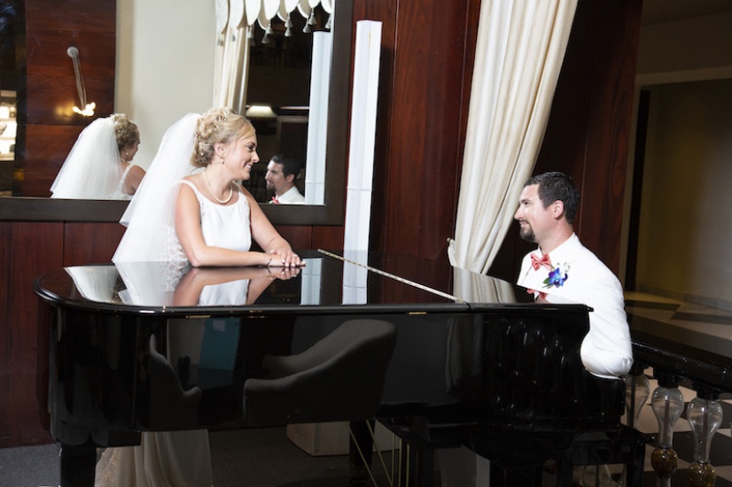 Couple at piano - Wedding Photographers in Jamaica